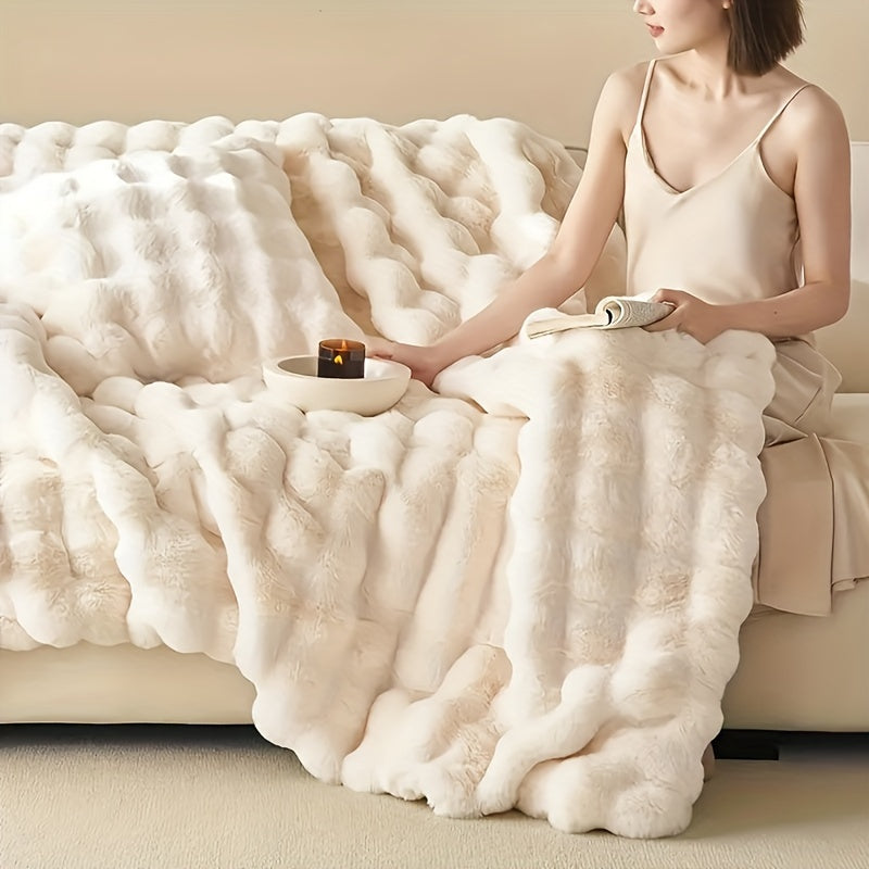 Plaid en fausse fourrure avec pompons – Fleece Tæppe | Rêve