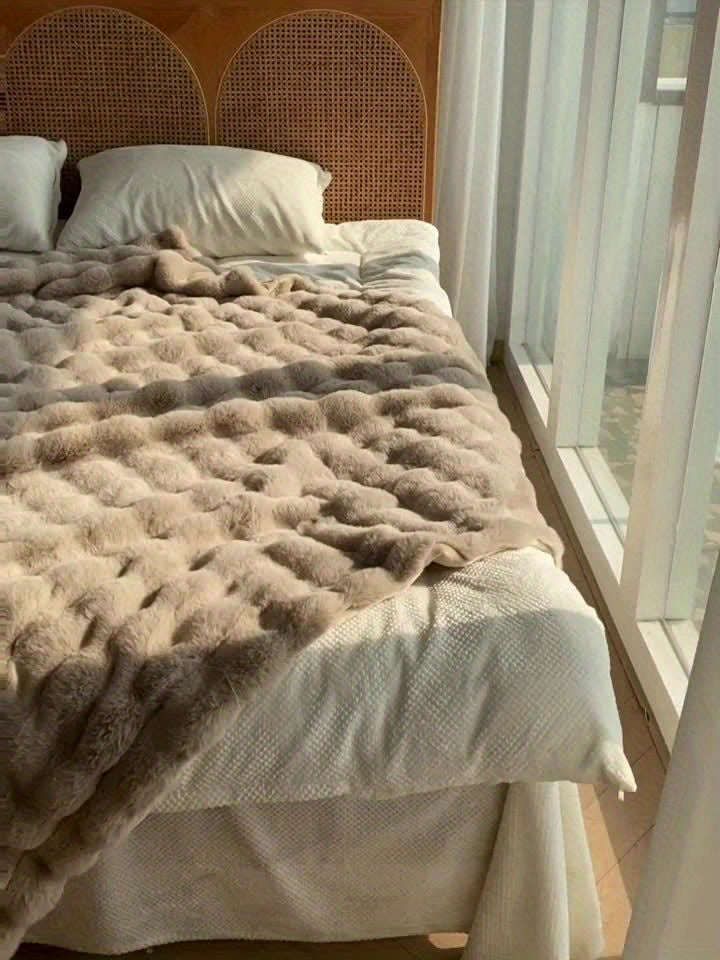 Plaid en fausse fourrure avec pompons – Fleece Tæppe | Rêve