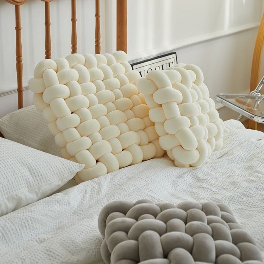 Coussin décoratif tressé en forme de nœud | Rêve