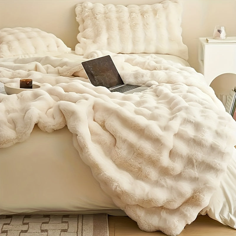Plaid en fausse fourrure avec pompons – Fleece Tæppe | Rêve