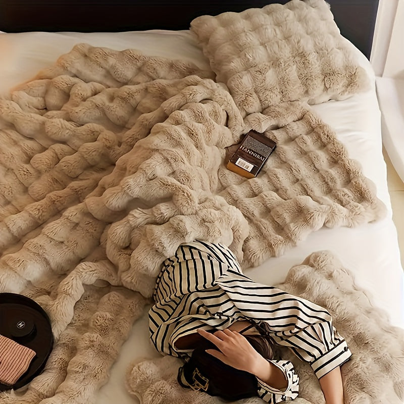 Plaid en fausse fourrure avec pompons – Fleece Tæppe | Rêve