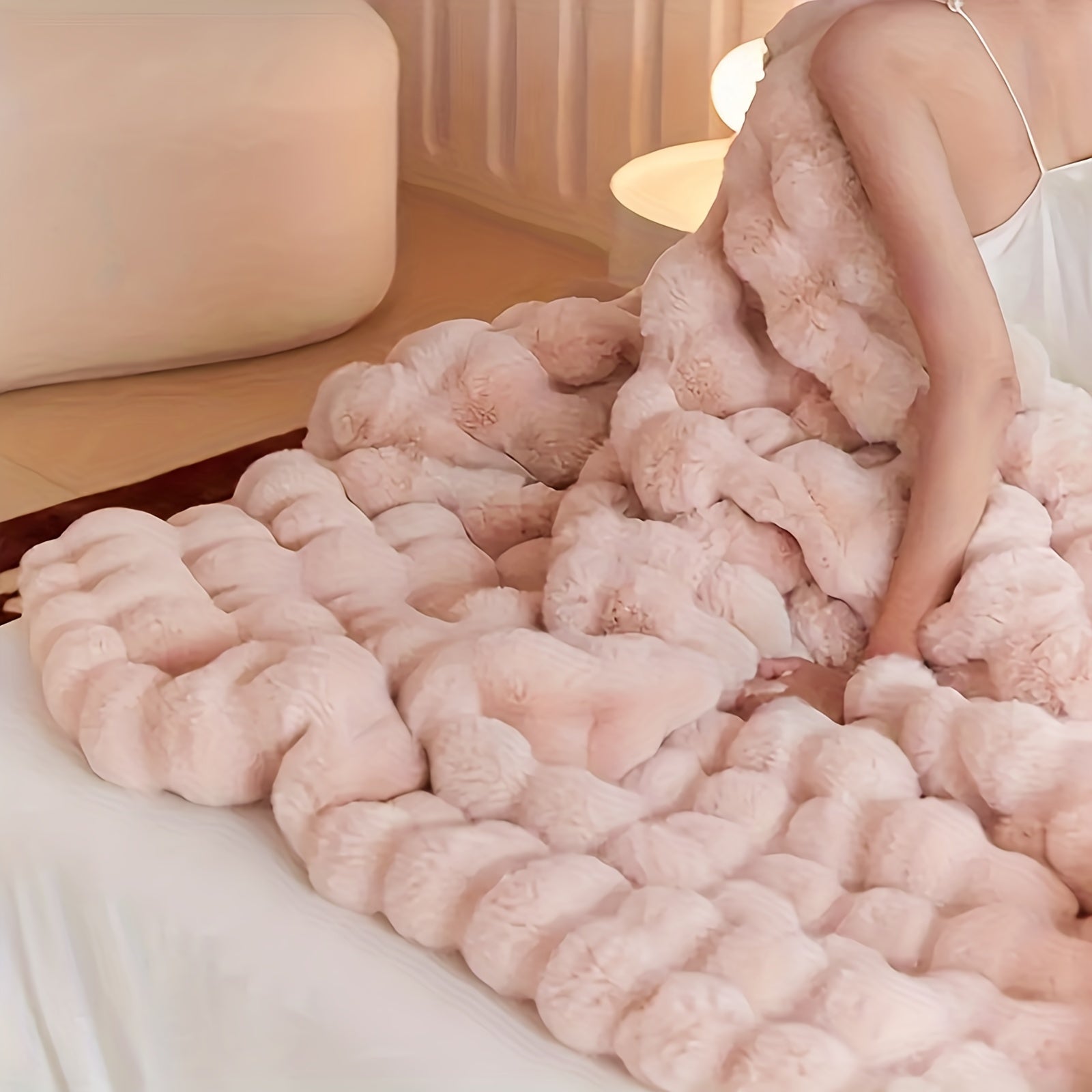 Plaid en fausse fourrure avec pompons – Fleece Tæppe | Rêve