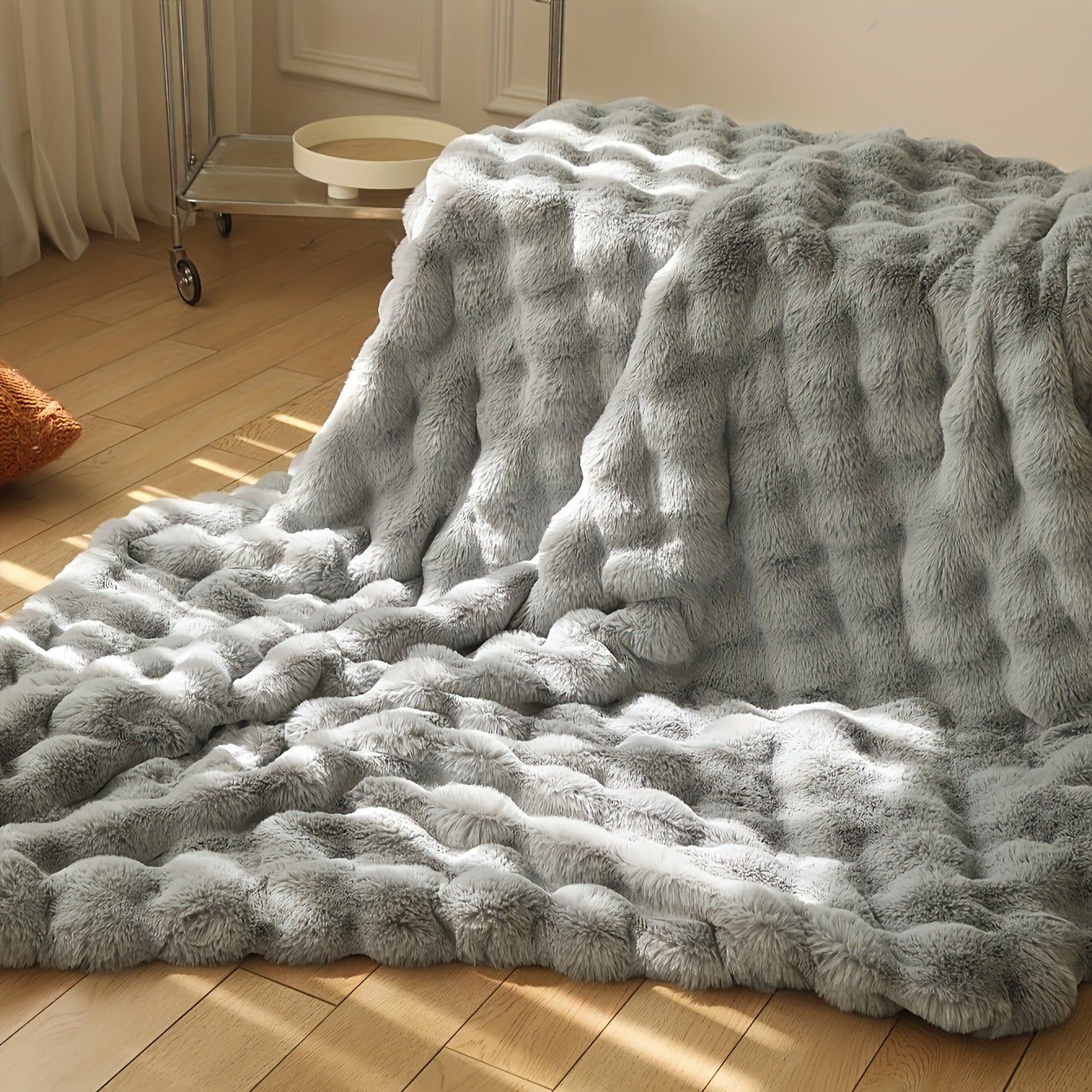 Plaid en fausse fourrure avec pompons – Fleece Tæppe | Rêve